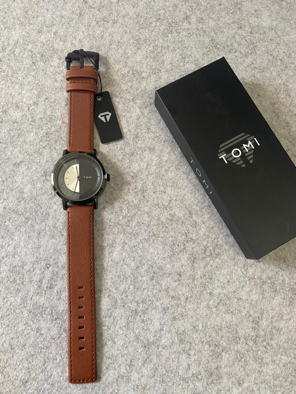 TOMI Minimalist Dual-Tone Quartz Watch – White & Rose Gold Half-Moon Dial with Tan Leather Strap